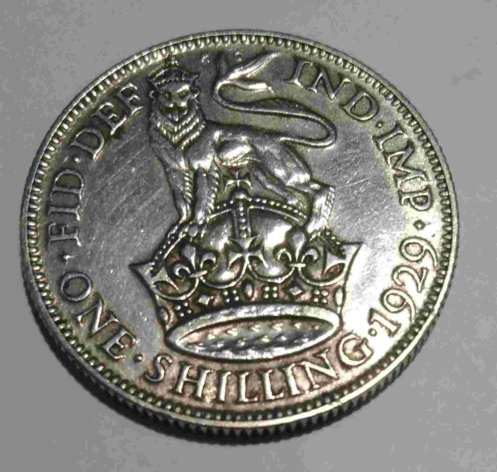 Uang perak Georgivs V Dwi Gra Britt Om Rex one Shilling 1929 .h.273