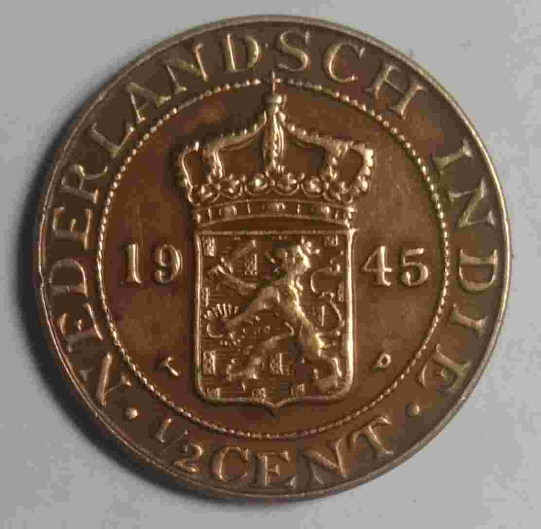 Uang Koin Nederlandsch Indie 1/2 Cent Tahun 1945 Bekas Pakai Sesuai Gambar.WN 910