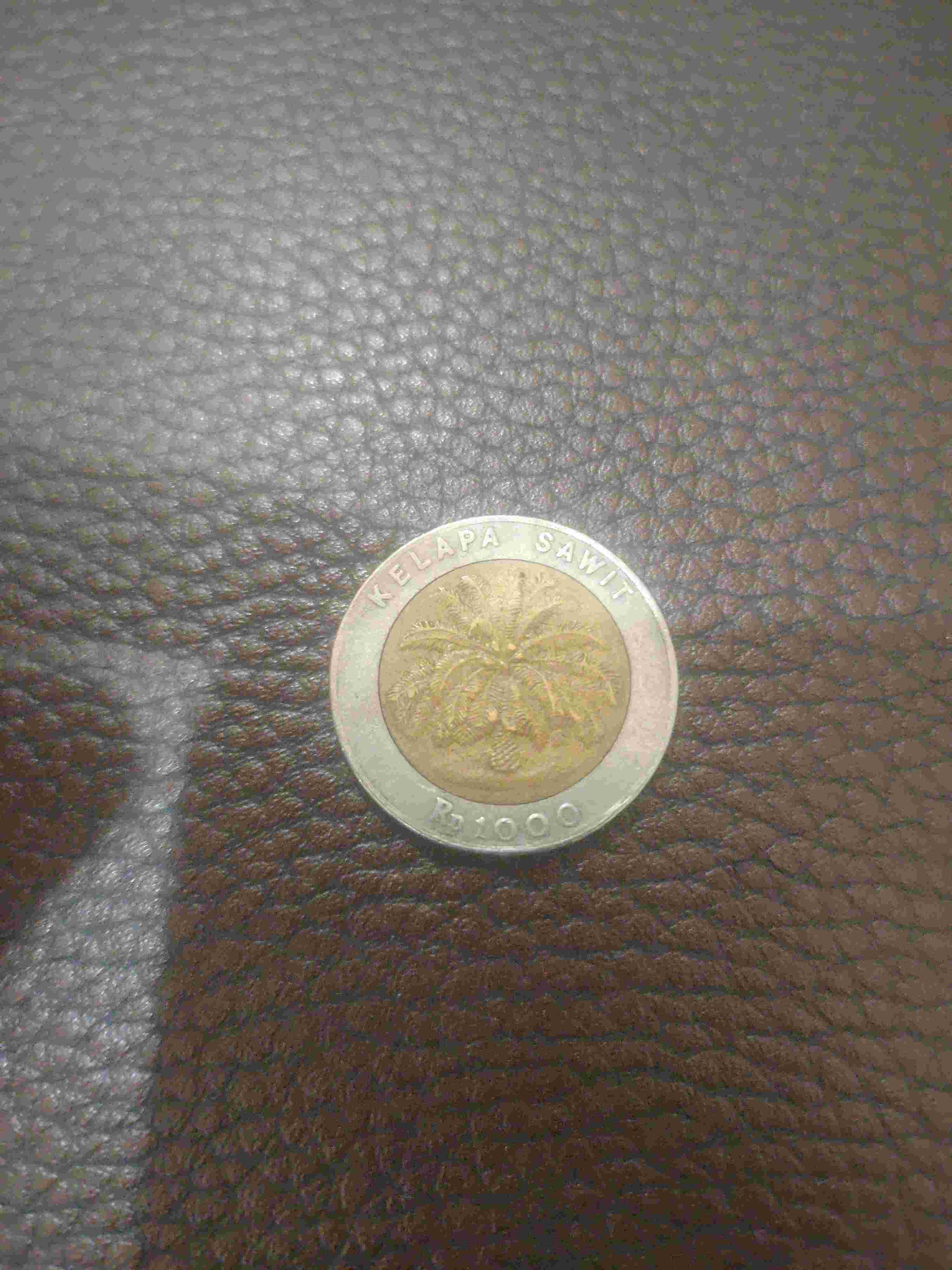 koin logam kelapa sawit